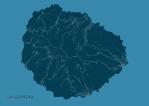 Map of La Gomera island, rendered in a monochromatic blue palette. The island's shape is clearly defined, with intricate white lines indicating roads, rivers, or topographical contours.
