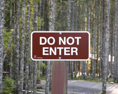 Do Not Enter sign at Chilliwack Lake Provincial Park during a fall season in Chiliwack, Fraser Valley, British Columbia, Canada