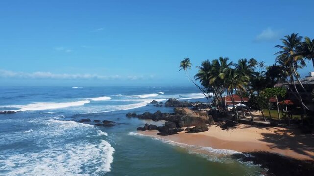 Beautiful aerial view of a tropical beach near Unawatuna, Sri Lanka