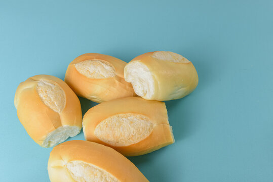 Brazilian bread pao frances on a minimalist table setting