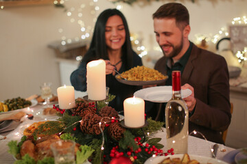 young couple celebrating christmas