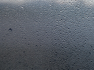 Condensation Water Drops on the glass background