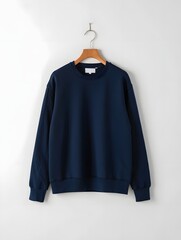 Navy blue crewneck sweatshirt mockup hanging on wooden hanger