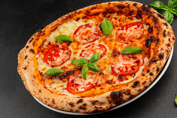 Pizza tomato margarita fast food natural product tasty snack fresh delicious gourmet food background on the table rustic top view copy space