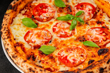 Pizza tomato margarita fast food natural product tasty snack fresh delicious gourmet food background on the table rustic top view copy space