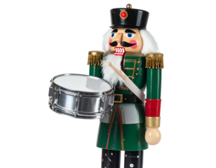 Festive wooden soldier figurine, drummer with green coat, holding drum and sticks