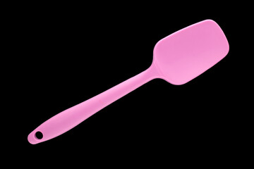 One silicone kitchen spatula isolated on black background, close-up, top view.