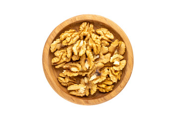 Shelled walnuts on a white background, macro, top view.