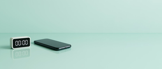 Digital clock and smartphone on pastel green surface, background
