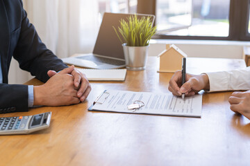 Asian tenant, client man sign signature contract rental purchase, buyer home or apartment with landlord, realtor after banker agreement mortgage, loan success or done. Property lease agent concept.