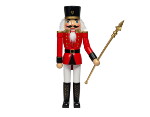 A wooden nutcracker soldier in a red coat and black hat, holding a staff