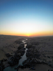 Namib desert dunes at Cunene River, the border between Angola and Namibia.