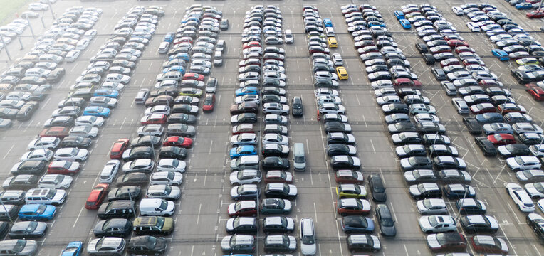 Fototapeta Aerial view of a storage facility for new cars