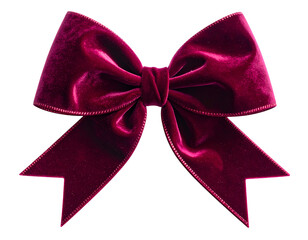 A deep red velvet bow isolated against black, showcasing intricate folds and texture