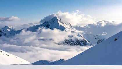 Snow-covered mountain peak emerges through fluffy clouds under a bright blue sky