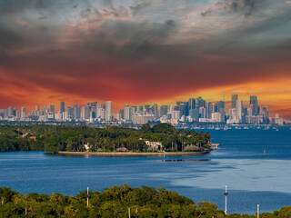 Aerial shot of skyscrapers and office buildings in the skyline at Matheson Hammock Park in Coral Gables Florida USA