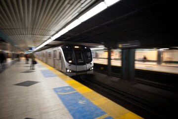 Subway Train Arriving at Underground Station