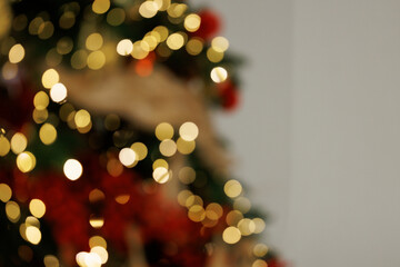 Blurred background, bokeh garlands in the background. New Year concept.