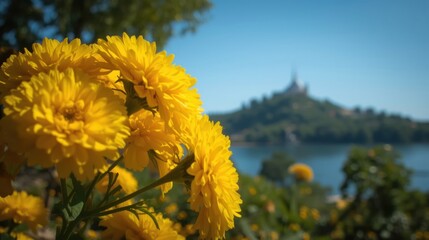 Bright yellow flowers overlooking a lake