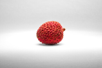 close-up shot of a lychee on a white background