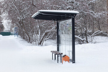 Bus stop in winter. Transportation in winter.