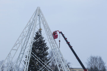 Setting up Christmas decorations on the city streets.