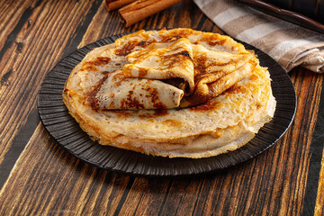 Thin homemade golden pancaces stack
