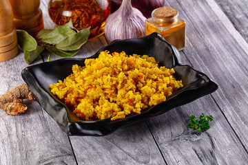 Indian yellow curry rice with tumeric