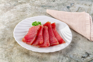 Raw red tuna sashimi slices
