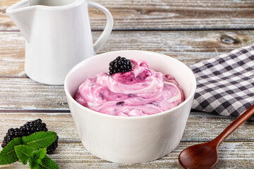 Organic tasty dairy yoghurt with blackberry