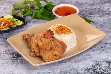 Roasted pork steak with rice