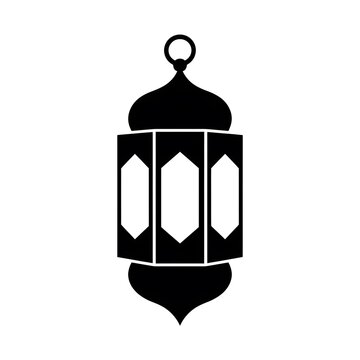Elegant black lantern with intricate design on white background