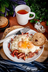 Fried egg and sliced sausage.