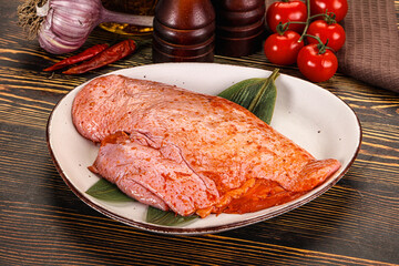 Raw marinated duck breast for cooking