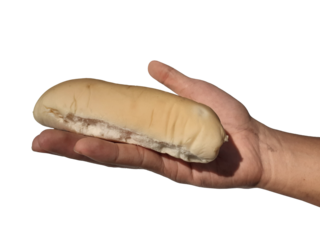 Holding a loaf of bread, isolated on a PNG background.	