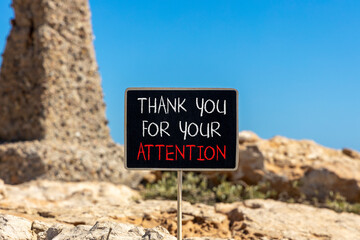Thank you for your attention symbol. Concept words Thank you for your attention on beautiful blackboard. Beautiful stone blue sky background. Business thank you for your attention concept. Copy space.