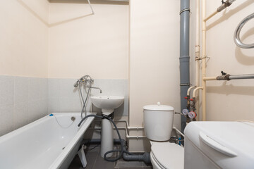 modern bathroom room with toilet and washing machine