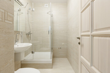 modern bathroom room with toilet and washing machine