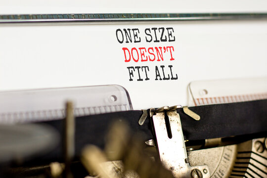 One size does not fit all symbol. Concept words One size does not fit all typed on beautiful old retro typewriter. Beautiful white background. Business one size does not fit all concept. Copy space.