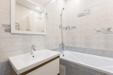 modern bathroom room with toilet and washing machine