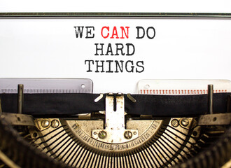 Support, help we can do hard things symbol. Concept words We can do hard things typed on beautiful old retro typewriter. Beautiful white background. Business we can do hard things concept. Copy space.