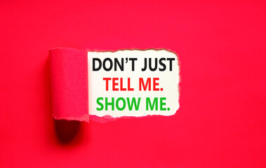 Tell or show symbol. Concept words Do not just tell me, show me on beautiful white paper. Beautiful red paper background. Business tell or show concept. Copy space.
