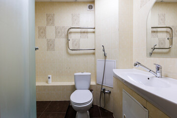 modern bathroom room with toilet and washing machine