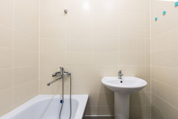 modern bathroom room with toilet and washing machine