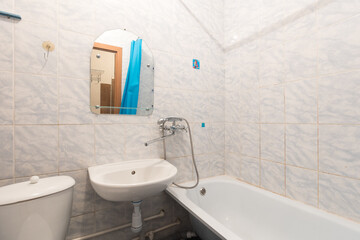 modern bathroom room with toilet and washing machine