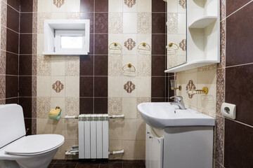 modern bathroom room with toilet and washing machine