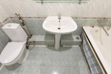 modern bathroom room with toilet and washing machine