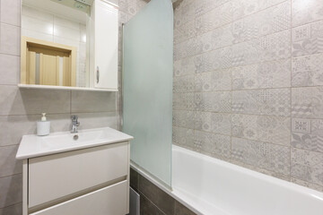 modern bathroom room with toilet and washing machine