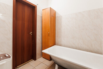 modern bathroom room with toilet and washing machine