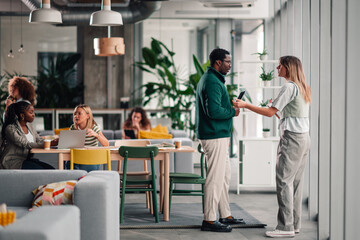 Business people collaborating in modern office working together